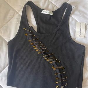 Black tank top with slit safety pins